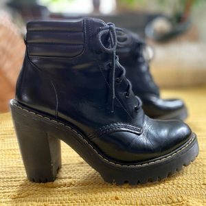 Dr. Martens used women’s size 8 high heels lace up boots.